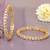 Ornate orbit solitaire gold plated bangles