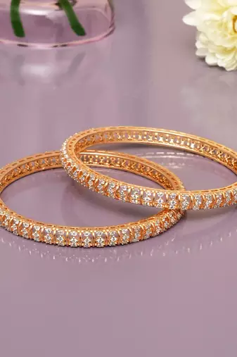 Graceful twirl gold plated diamond bangles