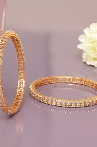 Graceful twirl gold plated diamond bangles