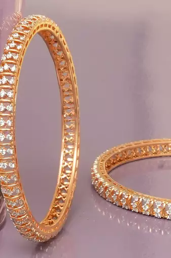 Graceful twirl gold plated diamond bangles