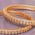 Graceful twirl gold plated diamond bangles