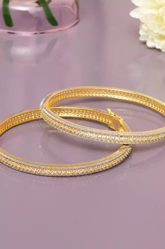 Regal row solitaire gold plated bangles