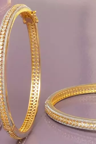 Regal row solitaire gold plated bangles