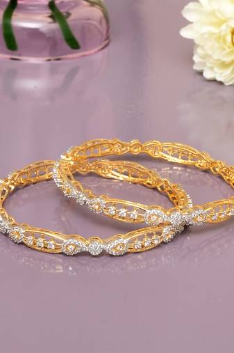 Swirling  solitaire gold plated diamond bangles