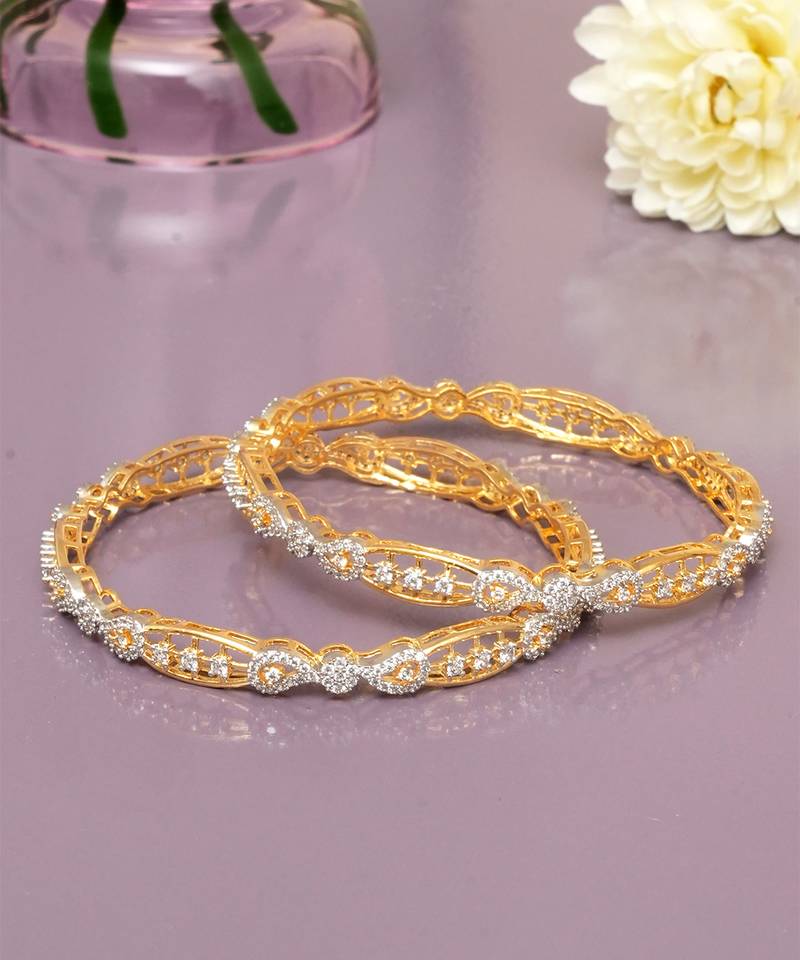 Swirling  solitaire gold plated diamond bangles