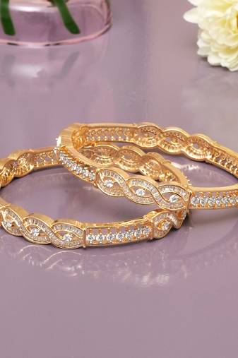 Radiant loop gold plated diamond bangles