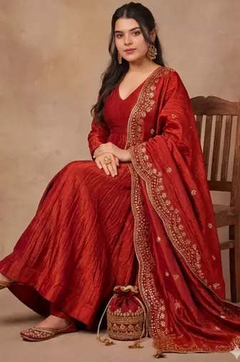 Rust color smart ethnic kum kum fabric suit for elegant party looks