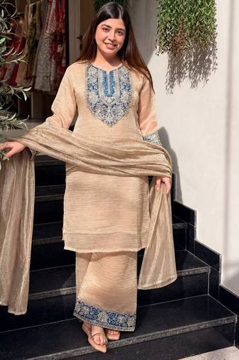 Cream color stylish crunchy fabric designer ready kurta set for girls