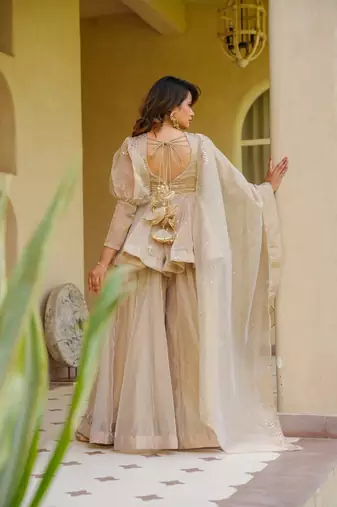 Cream color stylish crunchy fabric designer ready kurta set for girls