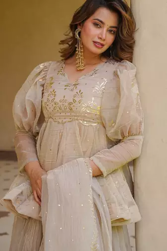 Cream color stylish crunchy fabric designer ready kurta set for girls