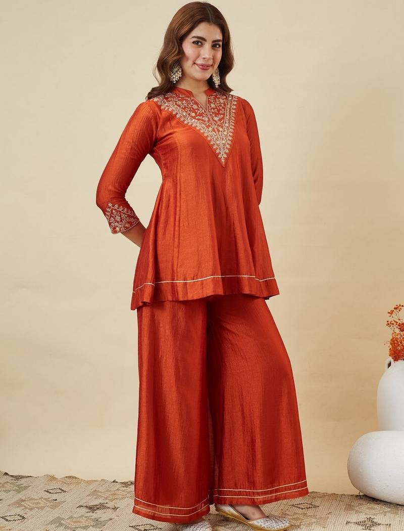 Orange color smart vichitra silk fabric beautiful partywear salwar kameez
