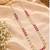 Maroon gold-plated moti mala two-line necklace