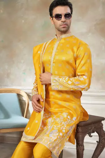 Yellow color graceful heavy ceremonial attire for men's fancy looks