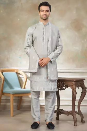 Grey color graceful heavy ceremonial attire for men's fancy looks