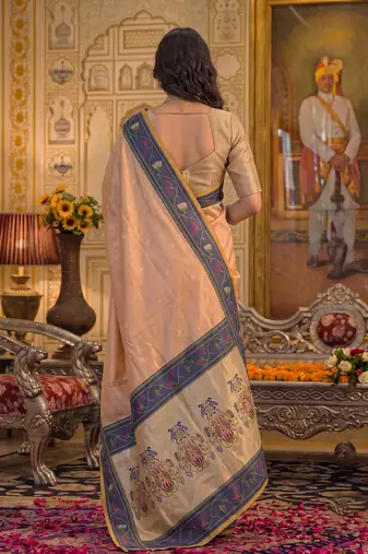 peach silk blend fabric saree with sophisticated woven designer
