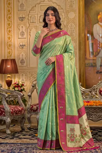 green silk blend fabric saree with sophisticated woven designer
