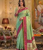 green silk blend fabric saree with sophisticated woven designer