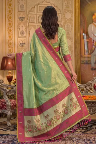 green silk blend fabric saree with sophisticated woven designer