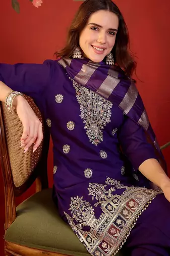 Purple silk blend embroidered kurta set.
