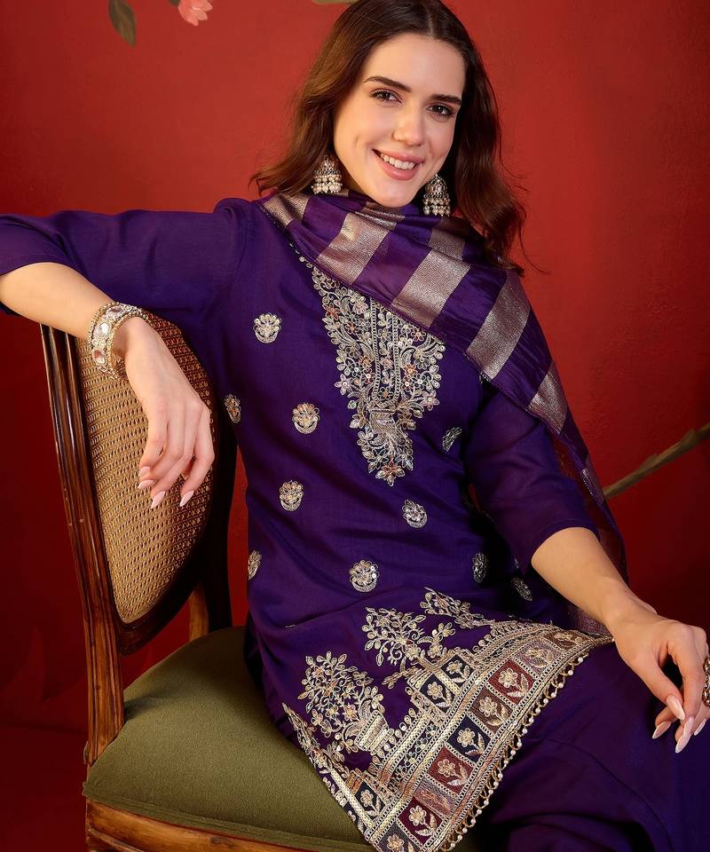 Purple silk blend embroidered kurta set.