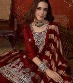 Maroon silk blend embroidered kurta set.