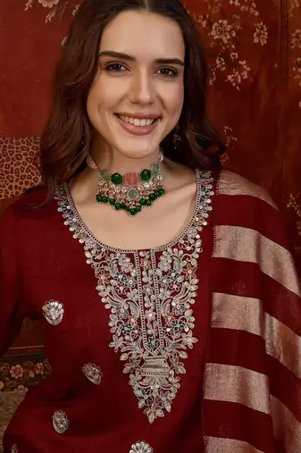 Maroon silk blend embroidered kurta set.