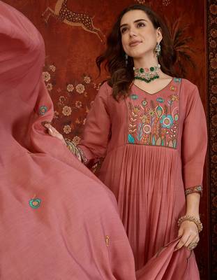 Peach cotton embroidered kurta set with dupatta. 1