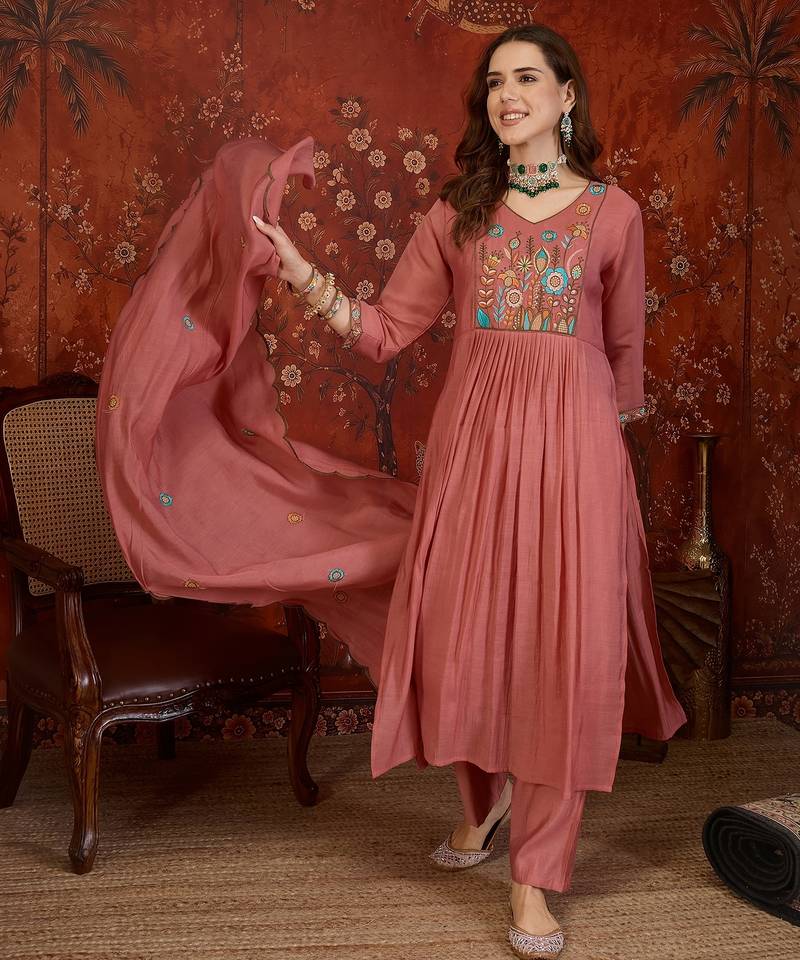Peach cotton embroidered kurta set with dupatta.