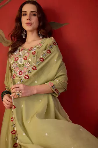 Pista cotton embroidered kurta set with dupatta.