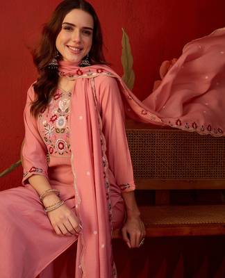 Peach cotton embroidered kurta set with dupatta. 1