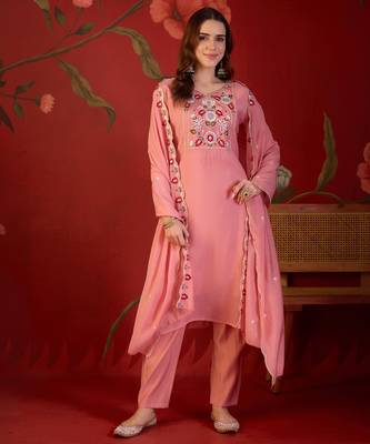 Peach cotton embroidered kurta set with dupatta. 2