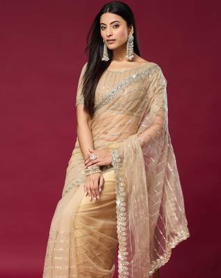 Chiku color smart elegant girlie partywear net sequins embroidered saree 3