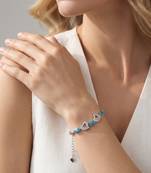 Silver Tone Adjustable  Heart Bracelet with Blue Stone Accents for Women