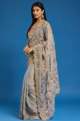 Grey tissue satin embroidered saree with unstitched blouse piece.