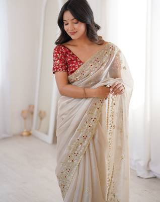 Beige tissue satin embroidered saree with unstitched blouse piece. 3