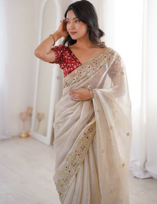 Beige tissue satin embroidered saree with unstitched blouse piece. 5