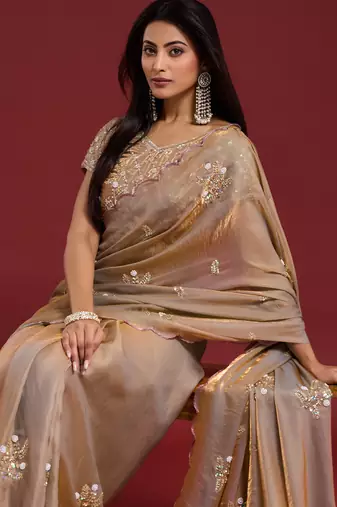 Beige tissue satin embellished saree with unstitched blouse piece.