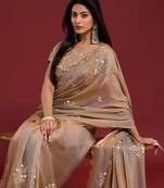 Beige tissue satin embellished saree with unstitched blouse piece.
