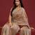 Beige tissue satin embellished saree with unstitched blouse piece.