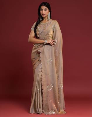 Beige tissue satin embellished saree with unstitched blouse piece. 2