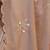 Beige tissue satin embellished saree with unstitched blouse piece.