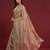 Beige tissue satin embellished saree with unstitched blouse piece.