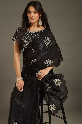 Black tissue satin embellished saree with unstitched blouse piece.