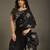 Black tissue satin embellished saree with unstitched blouse piece.