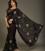 Black tissue satin embellished saree with unstitched blouse piece.