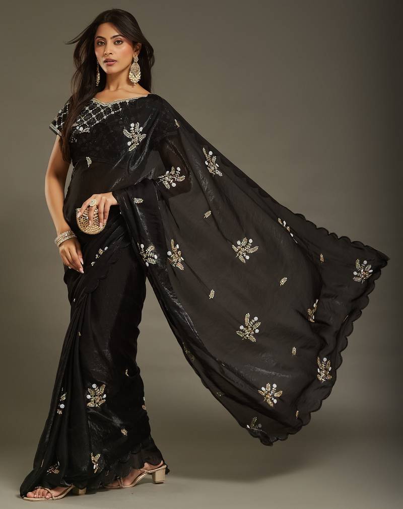 Black tissue satin embellished saree with unstitched blouse piece.