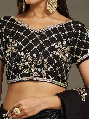 Black tissue satin embellished saree with unstitched blouse piece. 4