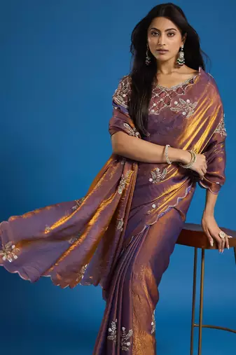Brown tissue satin embellished saree with unstitched blouse piece.