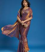 Brown tissue satin embellished saree with unstitched blouse piece.