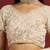 Cream tissue satin embellished saree with unstitched blouse piece.